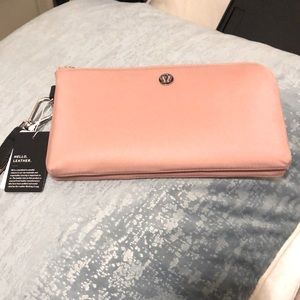BRAND NEW: Lululemon wallet in dark rose